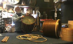 Cooperman Company Jim working on old drum