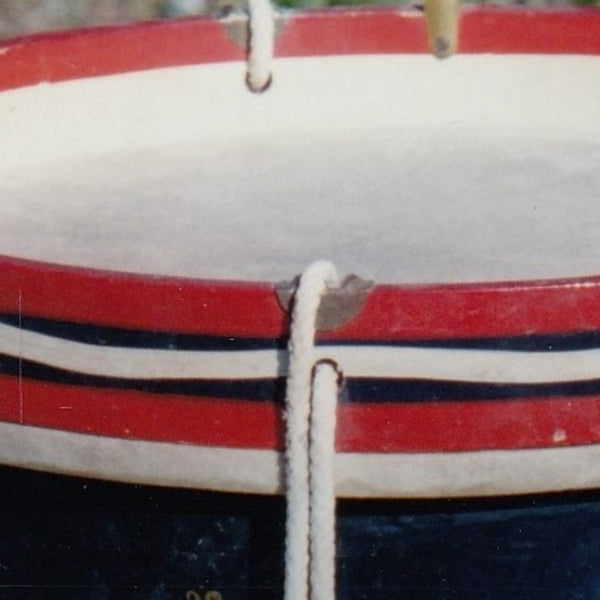 rope slides on older British regimental drum