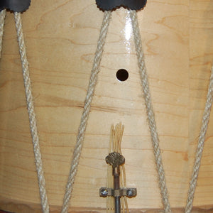 Cooperman drum showing natural hemp rope